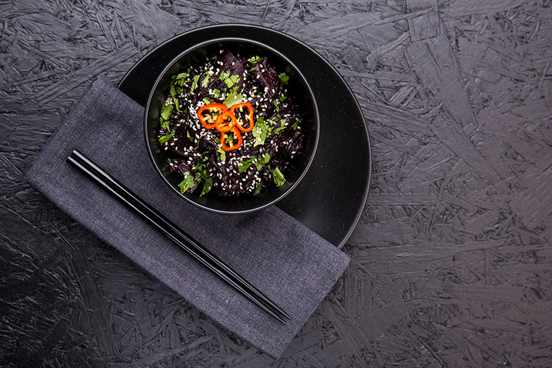 Black rice and wild mushrooms are the star of this one pot cooked on a base of onion, garlic & ginger, mixed with miso paste, mirin and vegetable stock then garnished with chilli, sesame seeds and coriander. It's a dark, rich and mysterious vegetarian and vegan one pot!