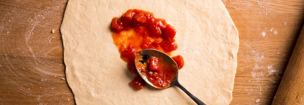 How to make authentic pizza sauce with just three ingredients, the best tomatoes you can get, ideally San Marzano, plus garlic and extra virgin olive oil all lightly infused together make the best genuine italian pizza sauce for your homemade pizzas.