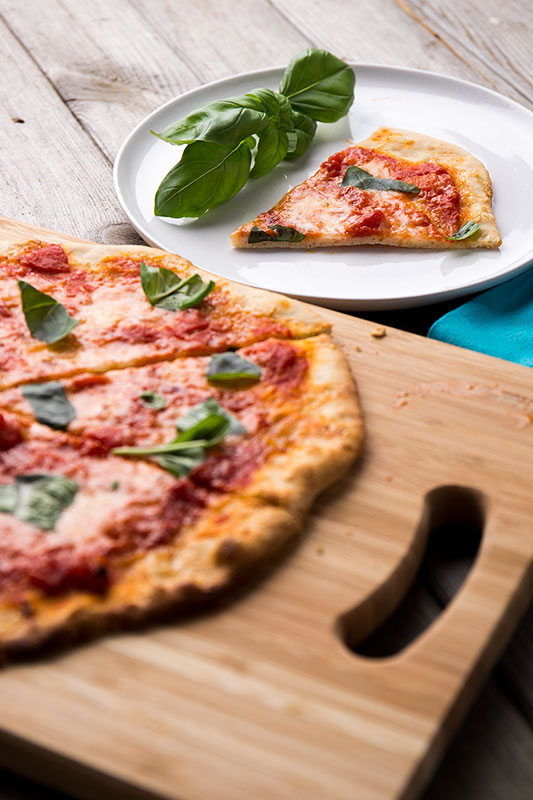 Perfect spelt pizza bases made with spelt flour to create crispy, thin crust, beautiful homemade pizzas that any Italian would be proud of to top how you like or enjoy the beauty of a margherita, perfect for the summer weather and a meal that everyone can get involved in.
