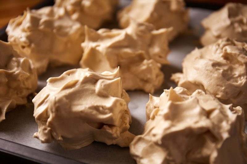 Fresh from my test kitchen, a new, no refined sugar recipe, tackling the mighty meringue, creating no added sugar meringues that use only date syrup as a sweetening agent, resulting in light, crunchy, honeycomb like meringues that are incredibly sweet and tasty, yet low in calories and feature no refined sugar. They make addictive sweet treats perfect for desserts, served alone or could be filled with a thick sauce, cream or smothered with ice cream and fruit for a decadent dessert.