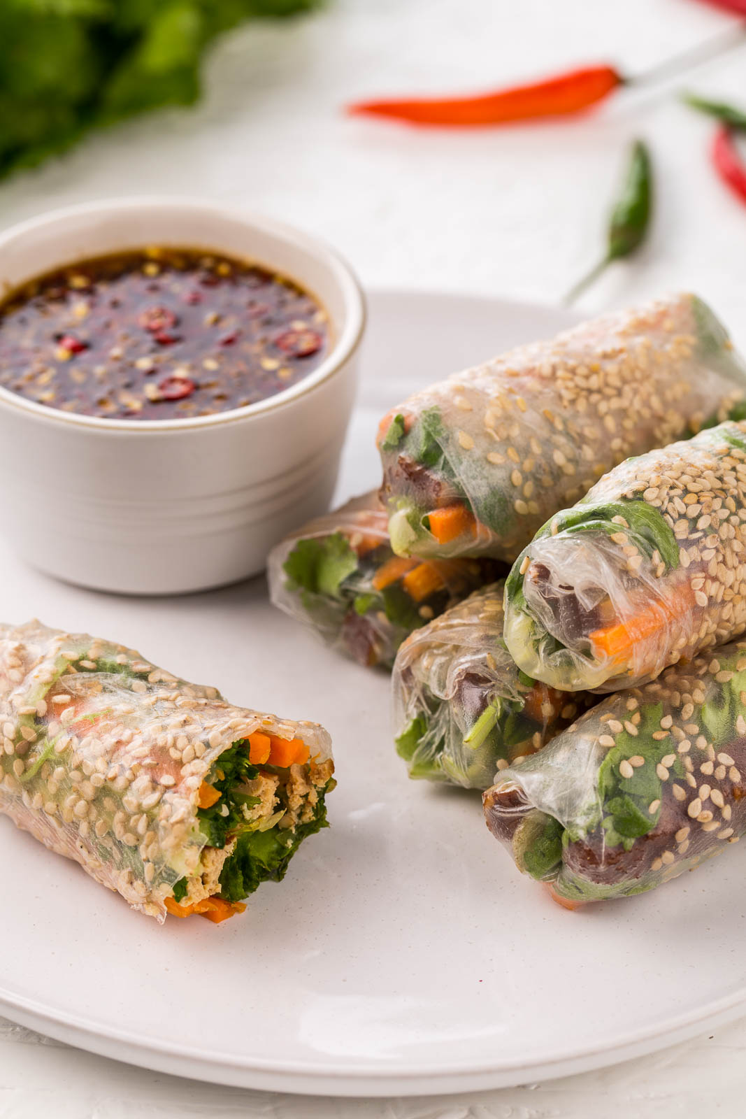 Vietnamese spring rolls with a vegetarian twist, featuring smoked tofu to make delightfully aromatic, crispy, crunchy tofu summer rolls which are vegetarian and vegan. You can make these in the kitchen to wow your guests or build them at the table so everyone can get their hands dirty.