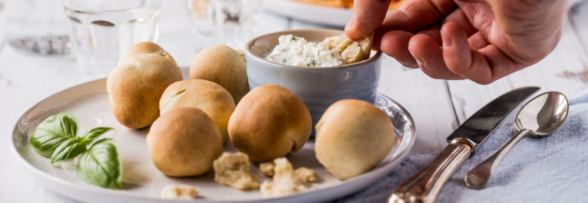 Hot, crunchy, soft, doughy balls of deliciousness, cooked in the oven alongside a perfect homemade spelt pizza. Dipping duties are handed over to a simple thick and creamy garlic coconut butter dip all ready to plunge these spelt dough balls into as soon as they're out of the oven.