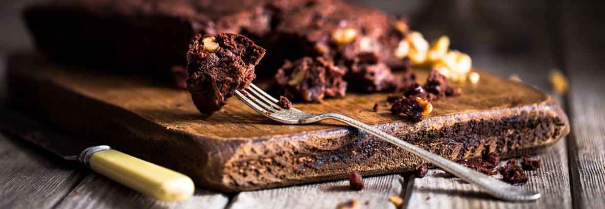 Low sugar dark chocolate spelt brownies made using dates to sweeten, providing a delicious rich brownie recipe with only a fraction of the sugar of most brownie recipes. These delicious brownies make a great treat if you're cutting out refined sugar or if you simply want to reduce your sugar intake without foregoing some delicious baked treats! Time to get baking!