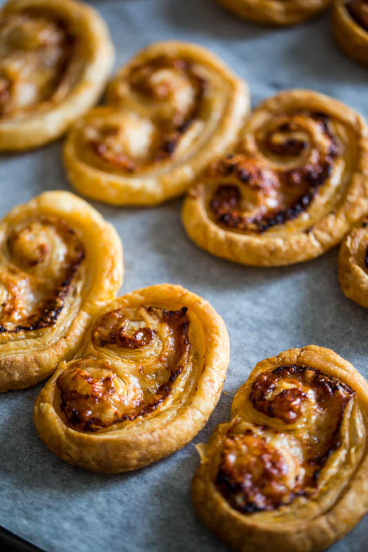 Home cooked palmiers take a few minutes to prepare, are quick to cook and can be flavoured however you want, be it sweet or savoury, meat or meatfree, cheese or chocolate. Great for kids to play around with and awesome to impress your guests when you whip your home made pastries out of the oven!