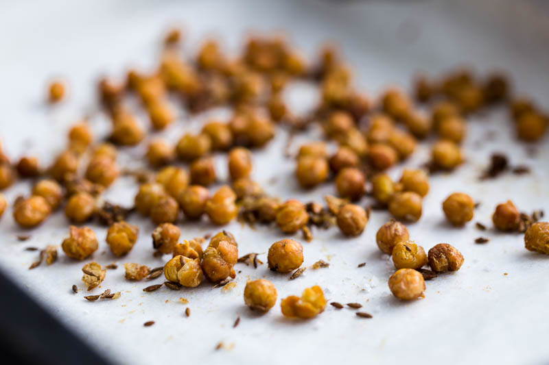 Roasted cumin chickpeas coated with cumin seeds, cumin powder, garlic, oil and salt then baked in the oven until they're crunchy, crispy little morsels of finger food, making the perfect nibble to go with your festive party plans. They're very easy to make and scale up to make a big batch easily, just keep a tin of chickpeas in the cupboard and amaze your guests with how resourceful you are!