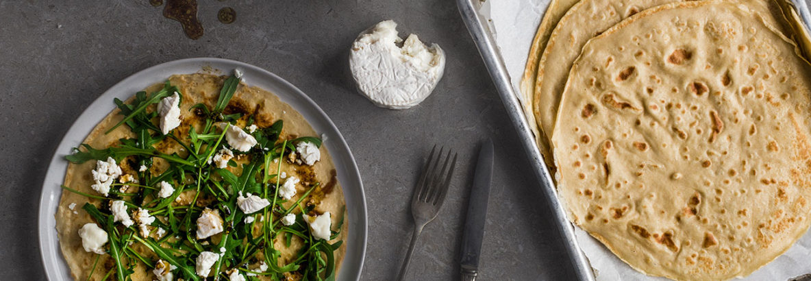Whether it's shrove tuesday or any other tuesday, you can always eat pancakes! Topped with crumbled goat's cheese, rocket and a rich, sweet pomegranate olive oil dressing, these savoury pancakes need very little prep so make an easy dinner. You can use the maple syrup on the next one!