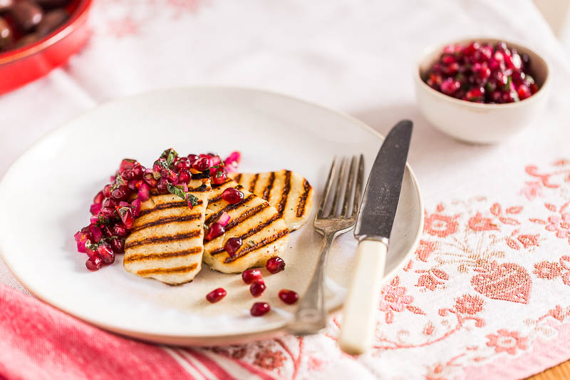 Soft, velveteen grilled halloumi cheese with pomegranate salsa makes a fantastic starter, the crunchy, sweet pomegranate seeds mix with bright, fresh mint, a dash of lime juice for a bright fresh salsa, slathered atop some hot grilled halloumi cheese deliver a truly joyful vegetarian dish!